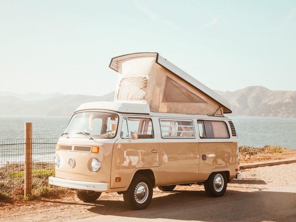 Vintage van with the water behind